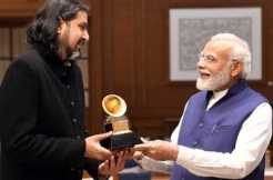 Modi takes the glam route, ties up with Grammy award winning singer 